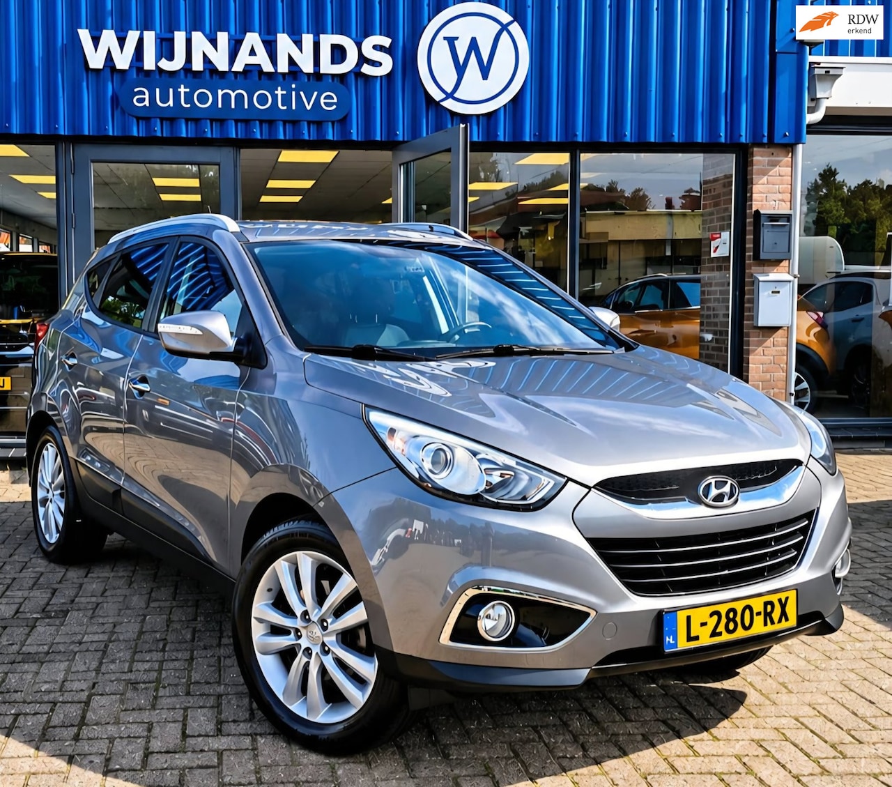 Hyundai ix35 - 2.0i 4WD Style Trekhaak Automaat Stoelverwarming - AutoWereld.nl