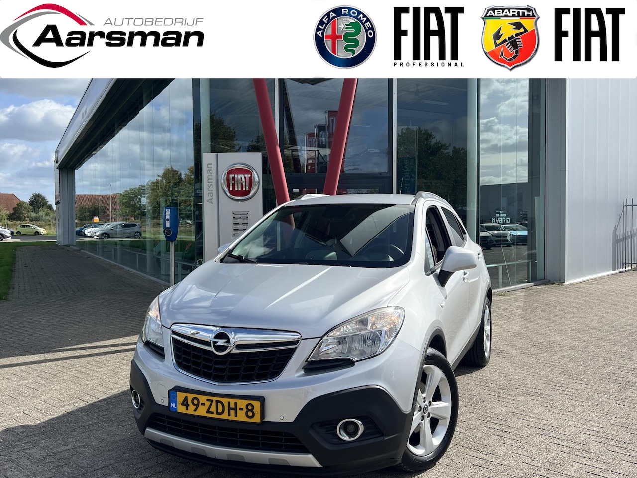 Opel Mokka - 1.6 Cosmo | Stoel-stuurverwarming | Navi | Leder | Climate control | Cruise control - AutoWereld.nl