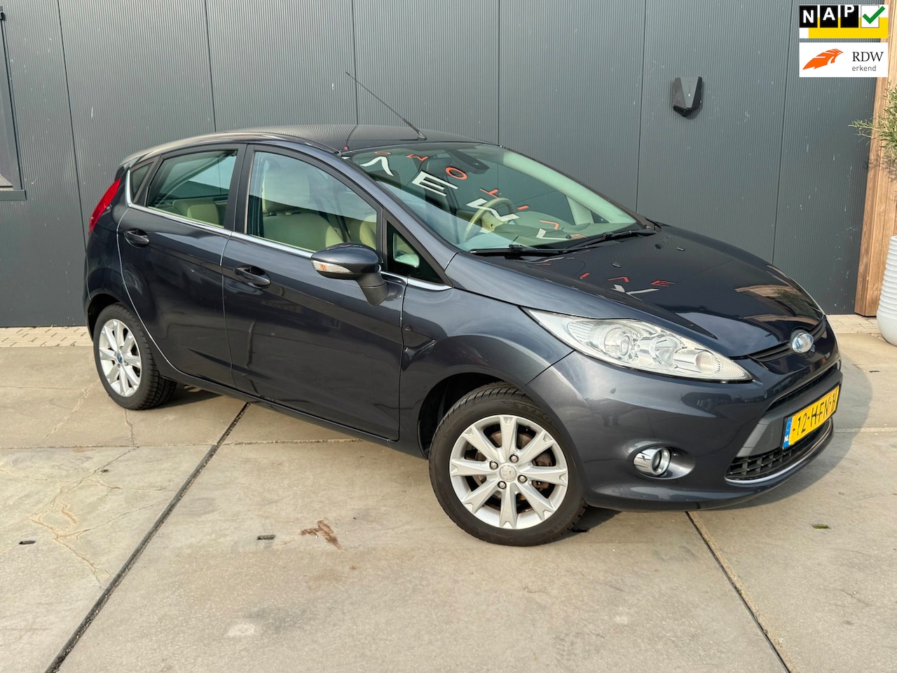 Ford Fiesta - 1.25 Ghia 2008 Airco 5 Deurs Cruise control - AutoWereld.nl
