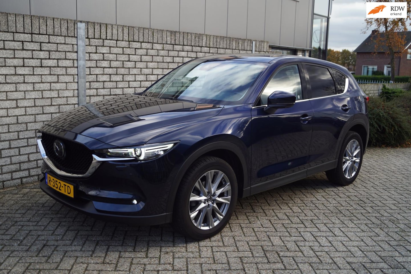Mazda CX-5 - 2.0 4WD SkyActiv-G 165 Signature Autom Leder Stoel Stuur en A Bank Verw Adapt Cruise Navi - AutoWereld.nl