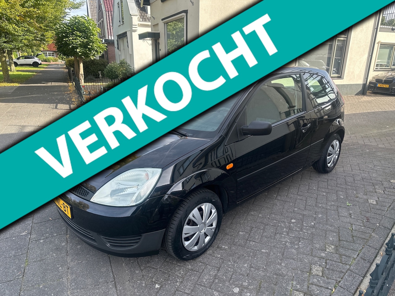 Ford Fiesta - 1.2-16V Ambiente rechter voor portier wat schade zie foto - AutoWereld.nl