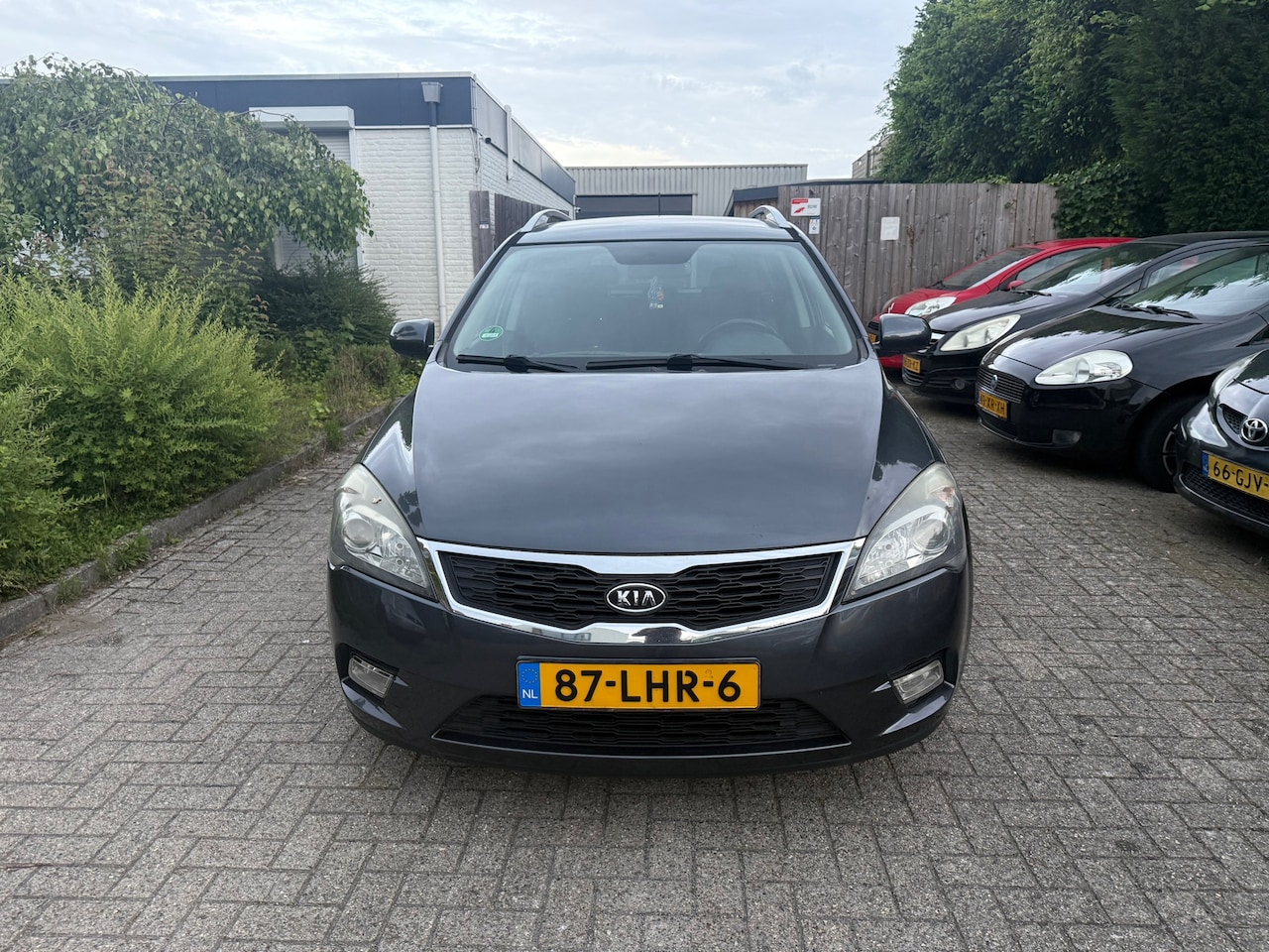 Kia Cee'd - 1.4 CVVT X-ecutive 1.4 CVVT X-ecutive - AutoWereld.nl