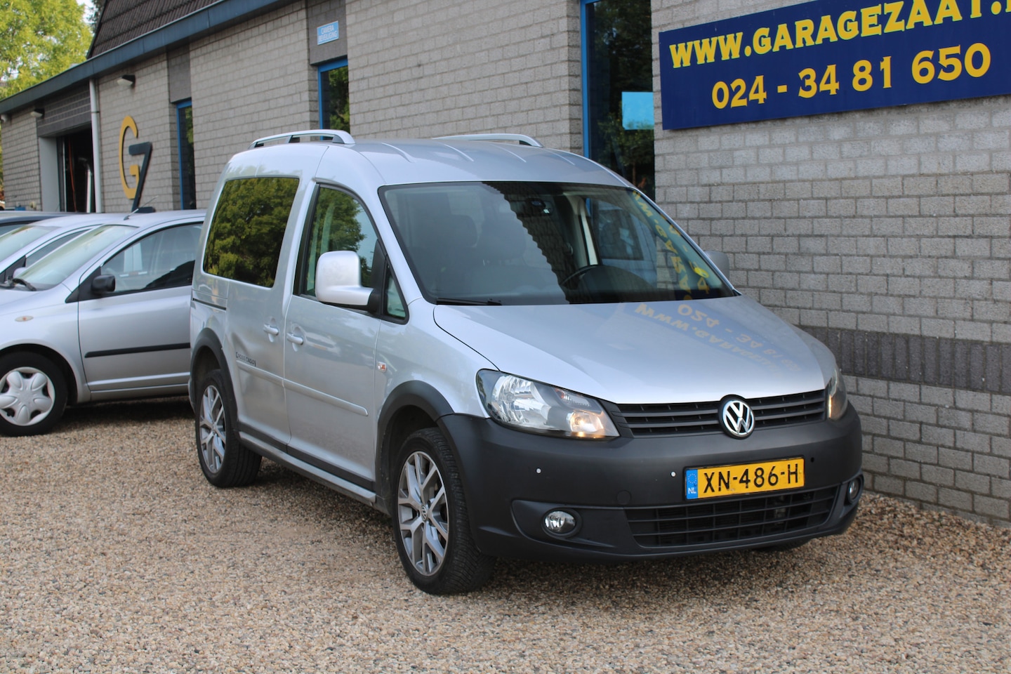 Volkswagen Caddy - Cross 1.6 TDI Highline Automaat Clima Navi Trekhaak - AutoWereld.nl