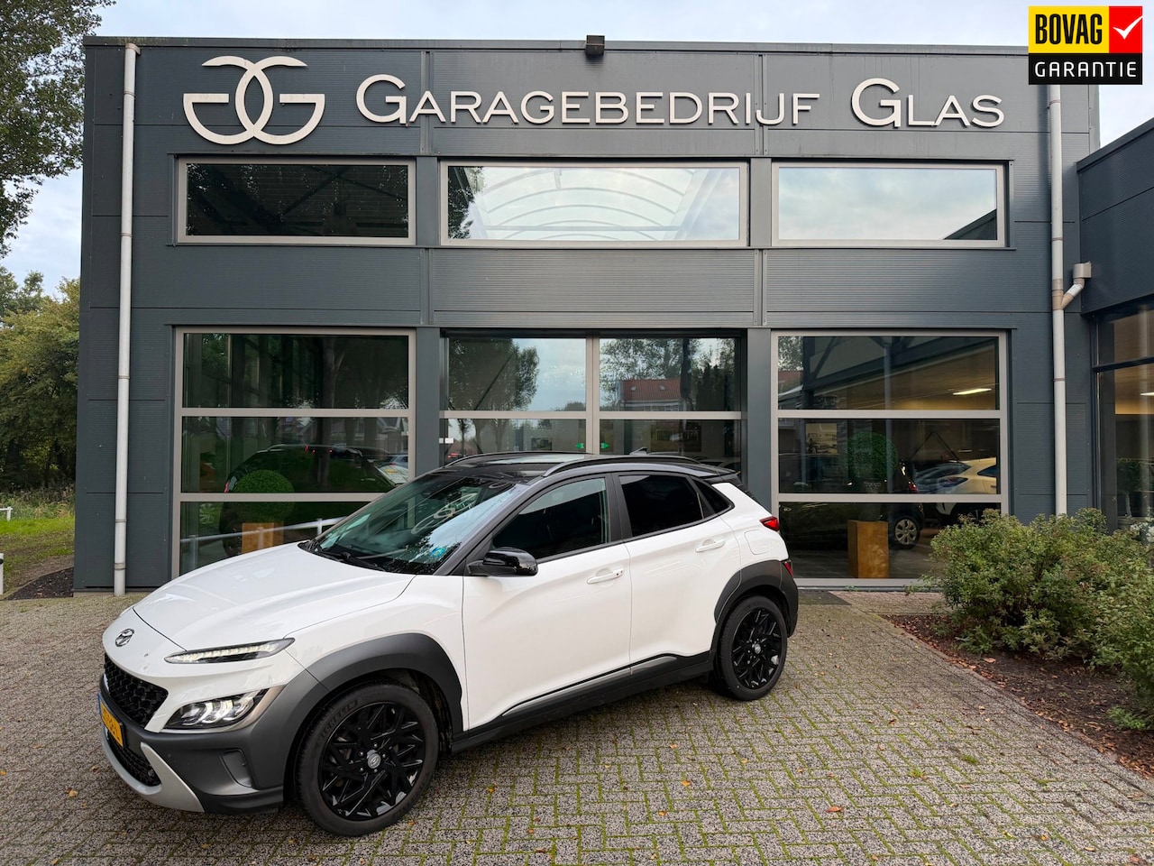 Hyundai Kona - 1.6 GDI HEV Fashion two tone - camera - AutoWereld.nl