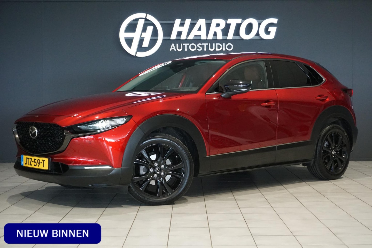 Mazda CX-30 - 2.5 e-SkyActiv-G M Hybrid Nagisa + HEAD-UP / DODEHOEK / CAMERA / STOELVERWARMING / - AutoWereld.nl