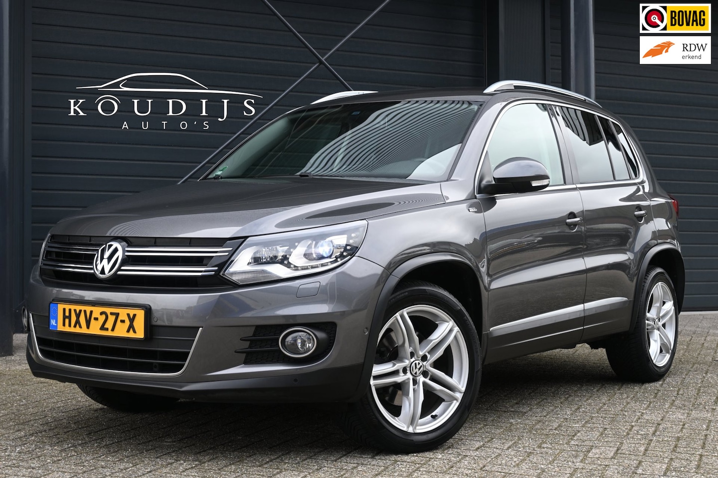 Volkswagen Tiguan - 1.4 TSI Sport&Style 4Motion, Stoelverw., PDC V+A, Volledig onderhouden - AutoWereld.nl