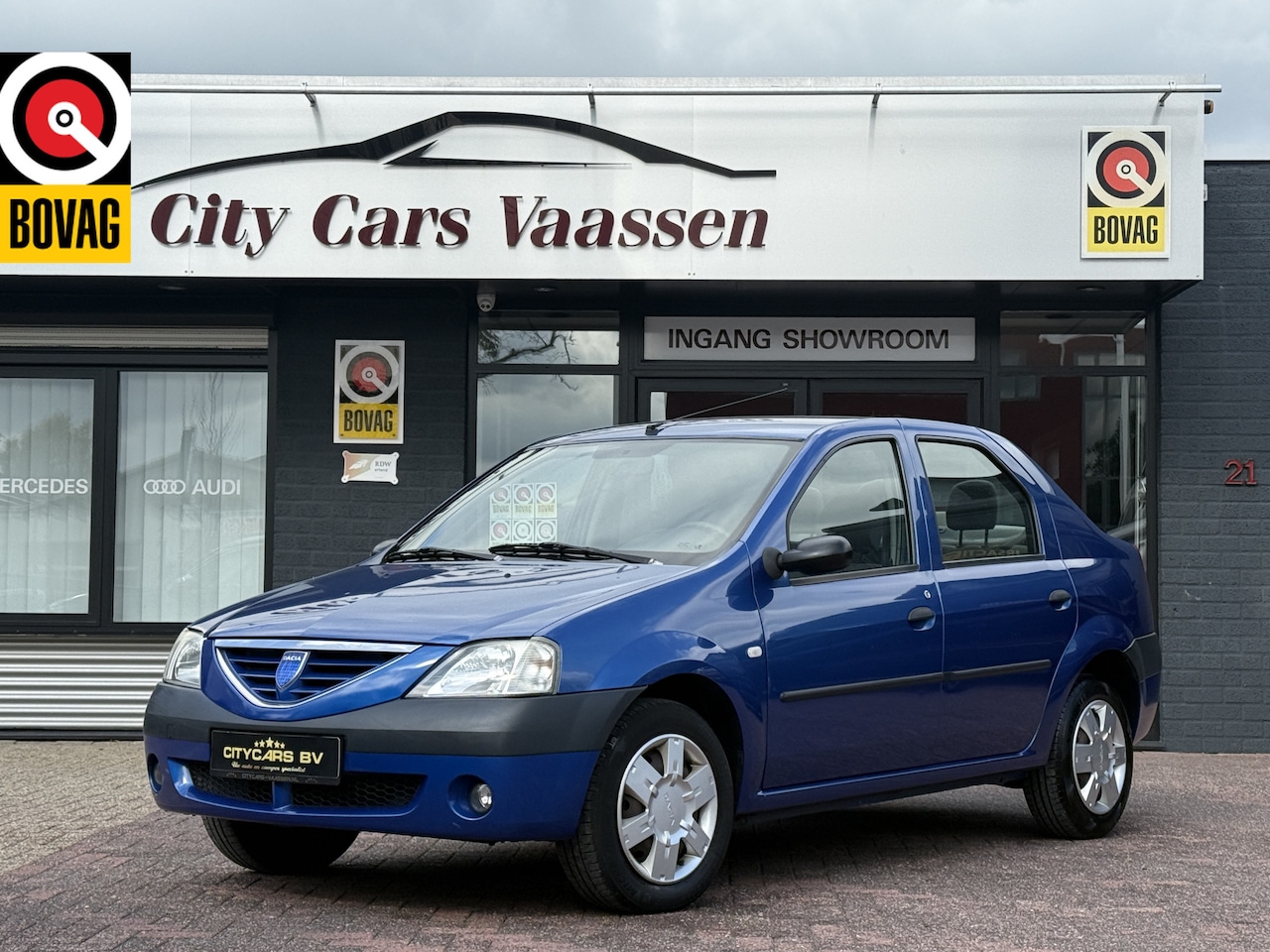Dacia Logan - 1.6 Lauréate 88 pk dis riem v.v 117 dkm 2022 airco elktr pakket org nl auto nap logisch de - AutoWereld.nl