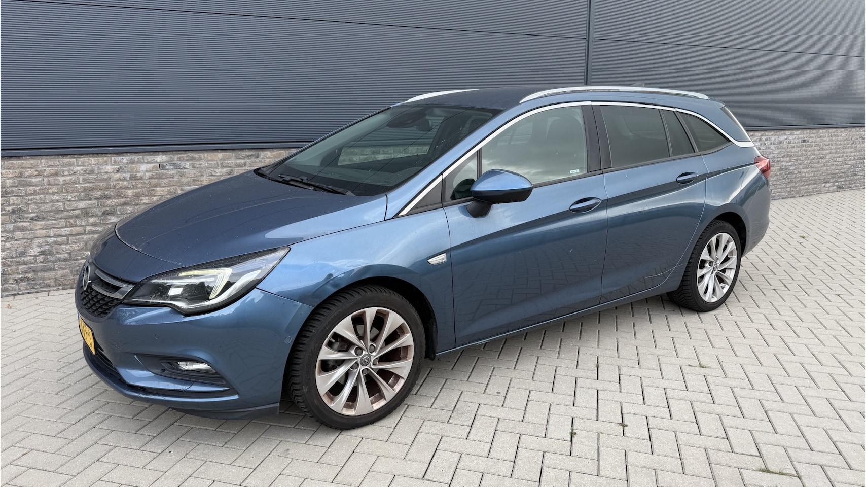Opel Astra Sports Tourer - 1.0 Innovation Navigatie / Trekhaak / Camera - AutoWereld.nl