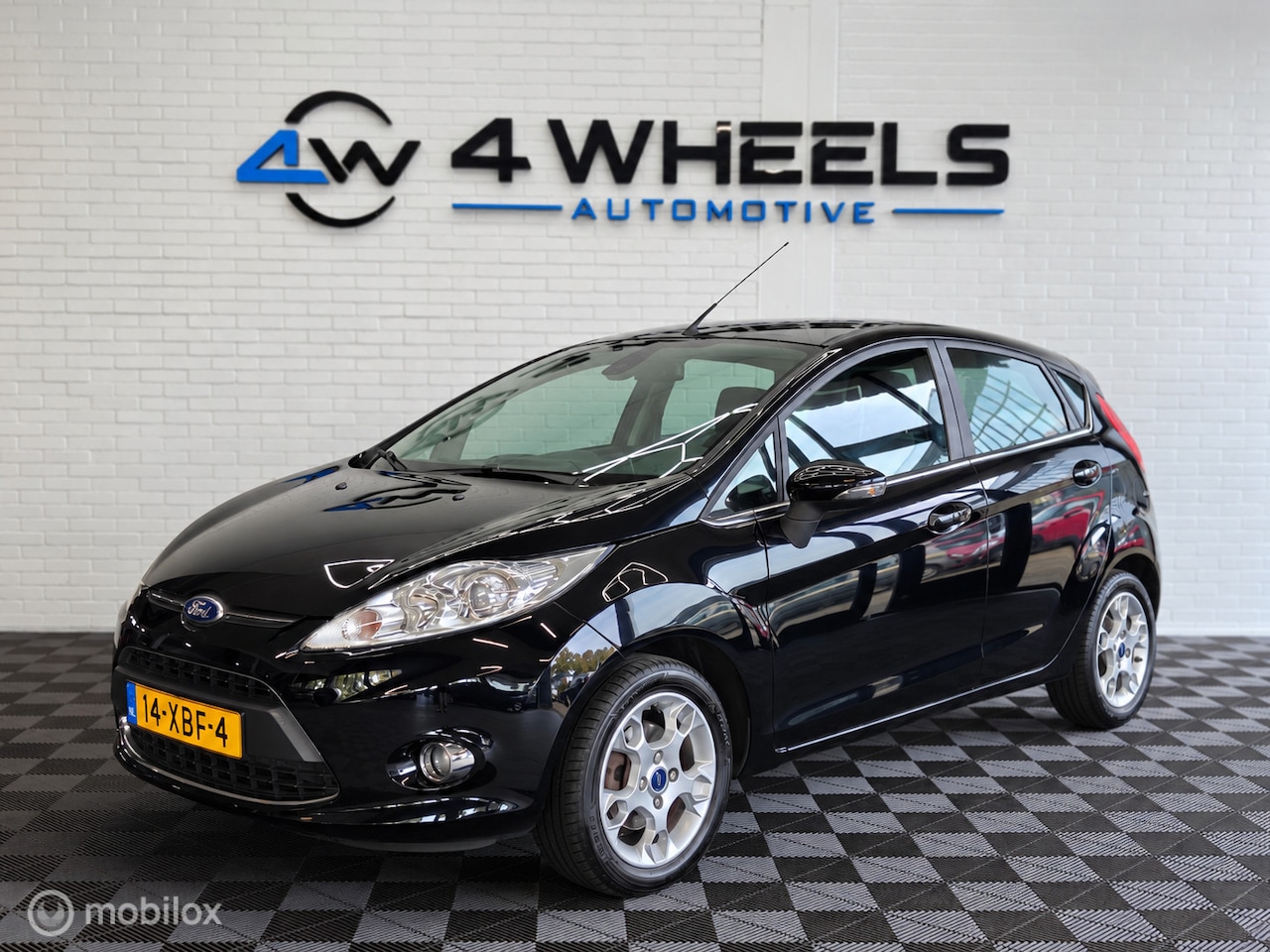 Ford Fiesta - 1.4 Titanium Champions League Edition - AutoWereld.nl