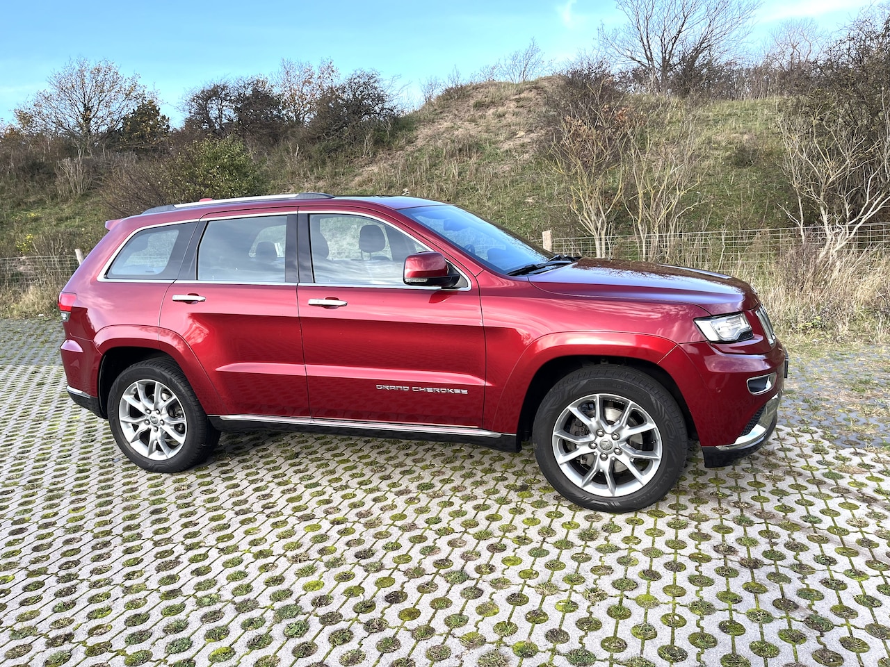Jeep Grand Cherokee - 5.7 Overland Summit - AutoWereld.nl