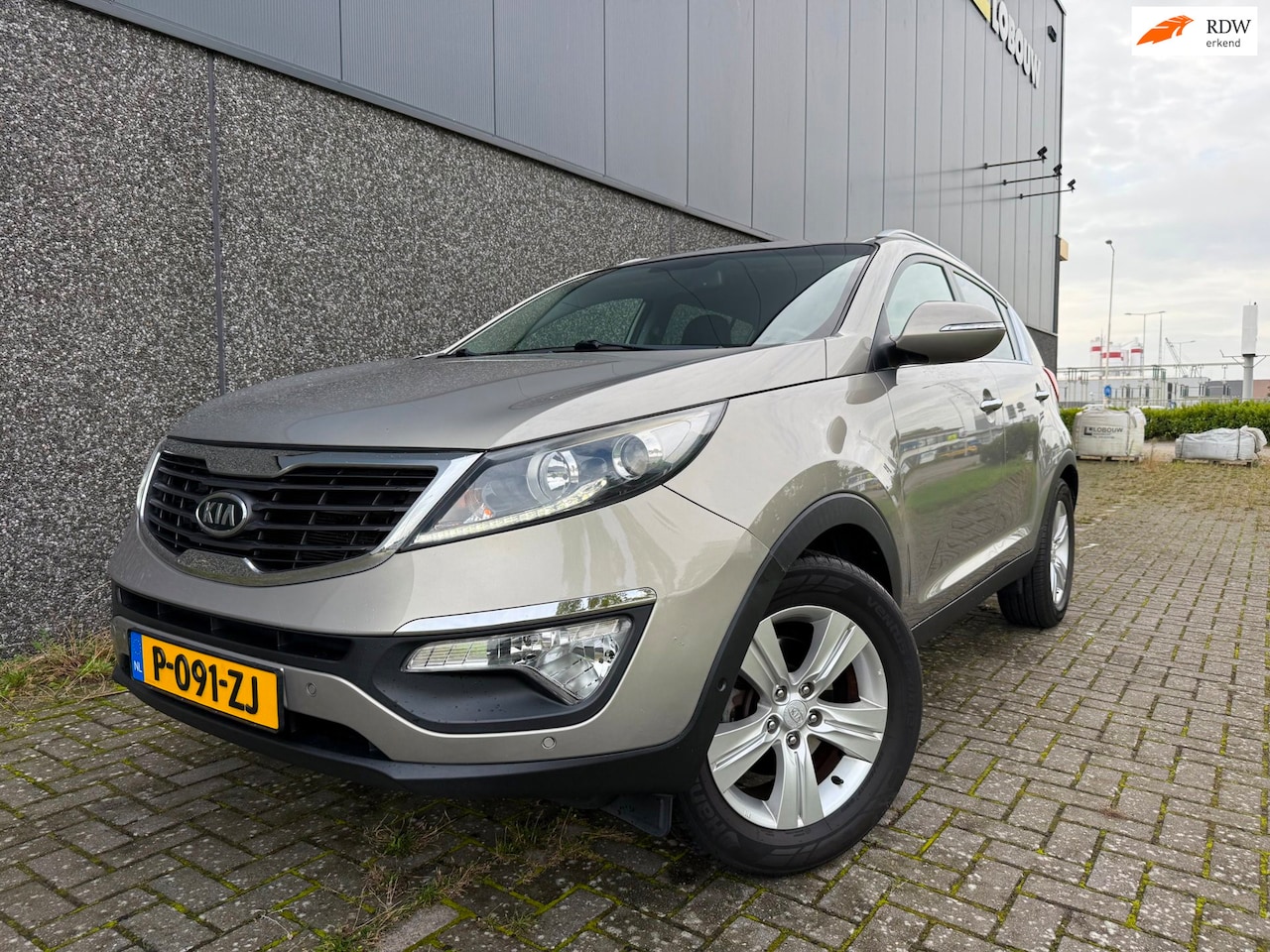 Kia Sportage - 1.6 GDI X-ecutive Plus Pack/NAVI/PDC/CRUISE/CAMERA - AutoWereld.nl