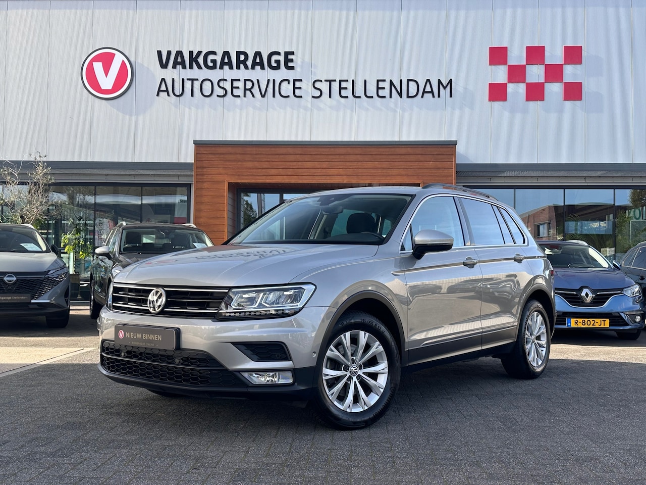 Volkswagen Tiguan - 1.4 TSI Comfortline|1e Eigenaar|Camera|Navigatie|Weinig km|PDC Rondom - AutoWereld.nl