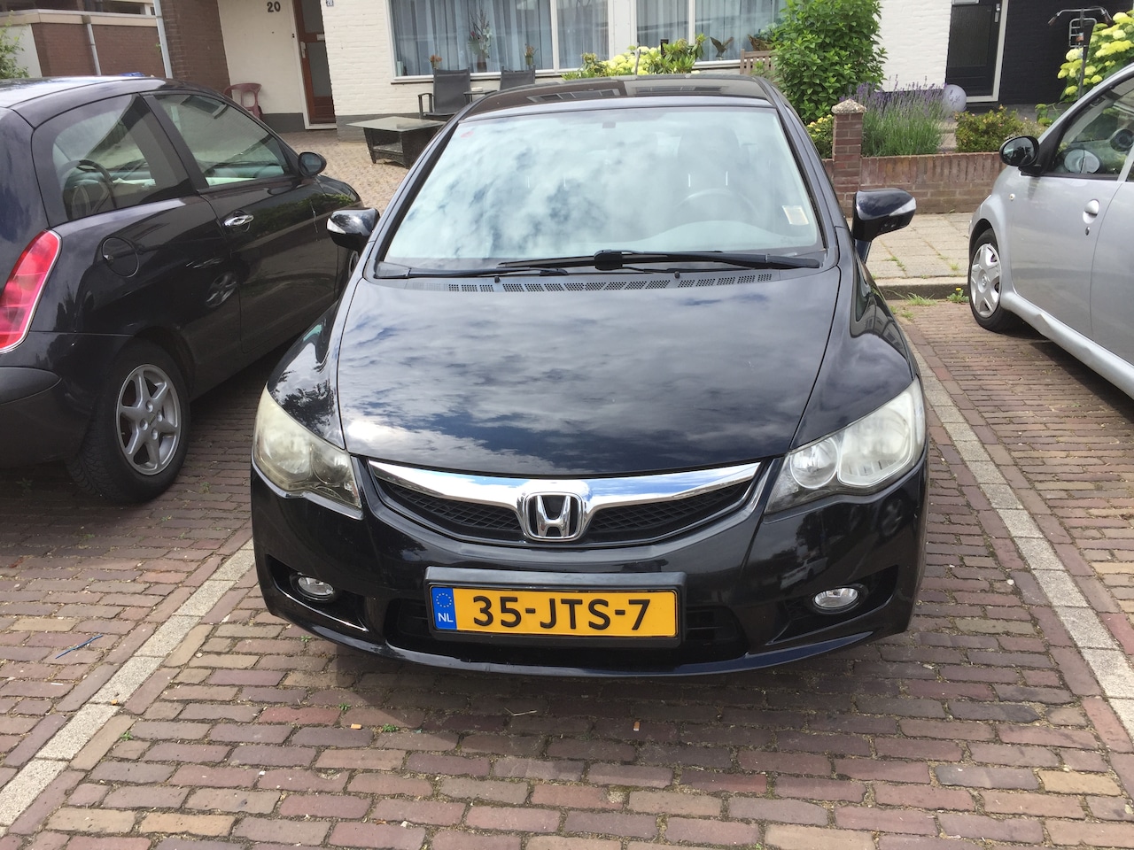 Honda Civic - 1.3 Hybrid leer bekleding - AutoWereld.nl