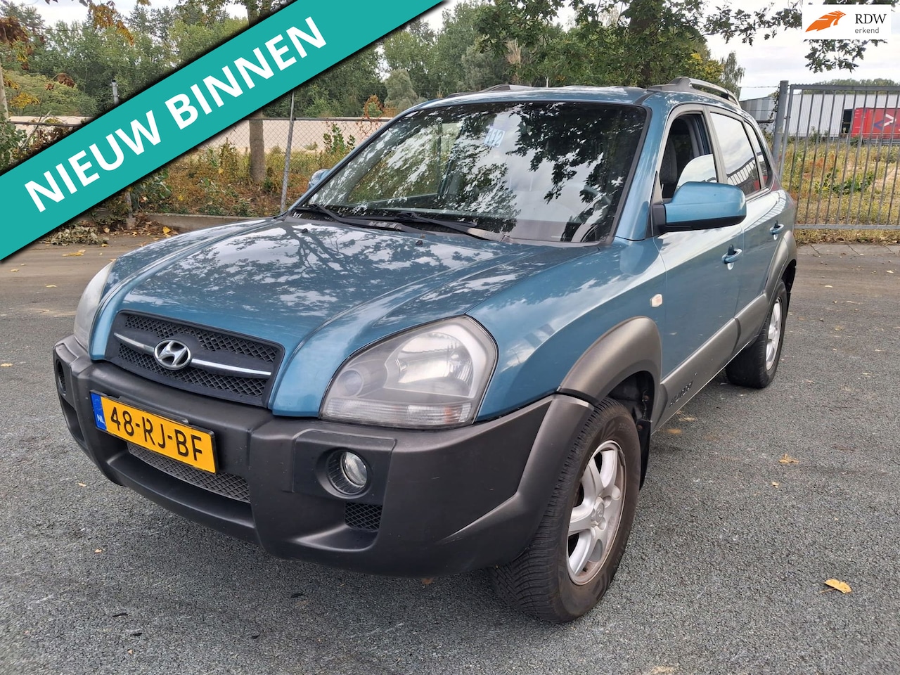 Hyundai Tucson - 2.0i Dynamic FIJNE HOGE INSTAP EN GOEDKOOP - AutoWereld.nl