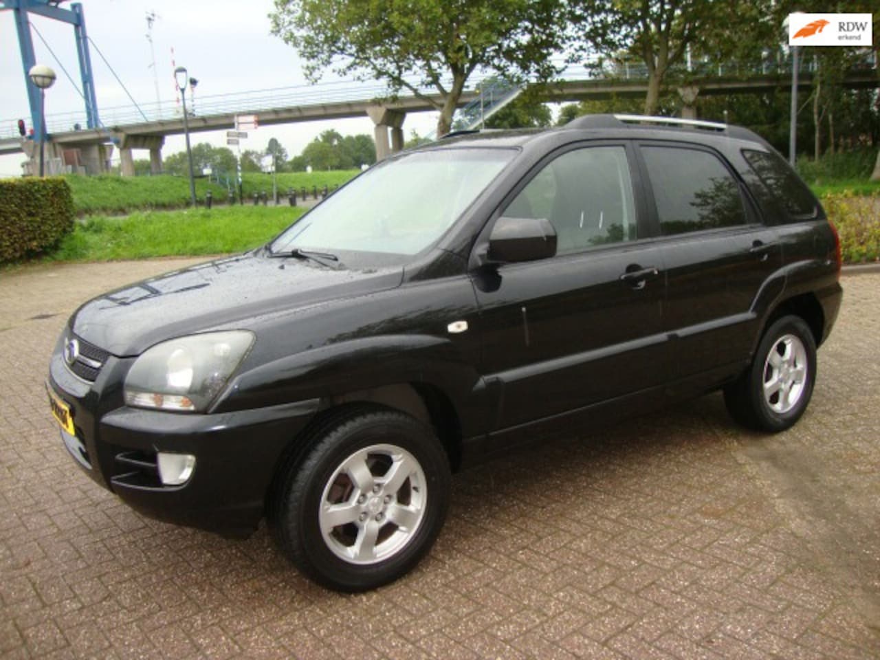 Kia Sportage - 2.0 CVVT X-ecutive 2.0 CVVT X-ecutive - AutoWereld.nl
