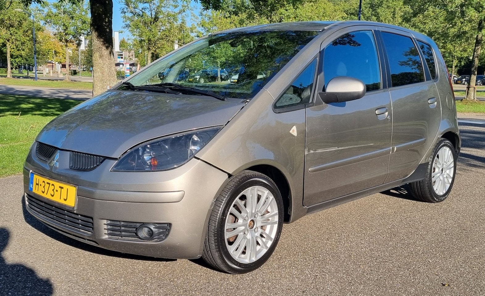 Mitsubishi Colt - 1.1 Incharge - AutoWereld.nl