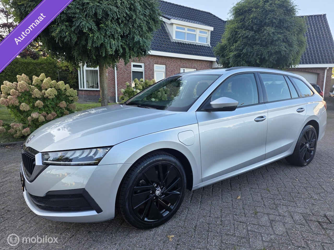 Skoda Octavia Combi - 1.4 TSI iV PHEV Sportline /Navi/carplay. - AutoWereld.nl