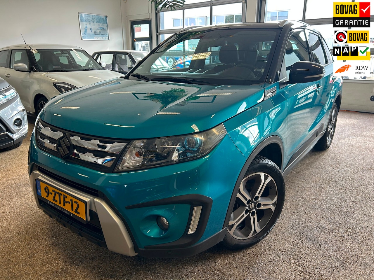Suzuki Vitara - 1.6 High Executive Outdoor|Navi| Carplay| Pano-dak - AutoWereld.nl