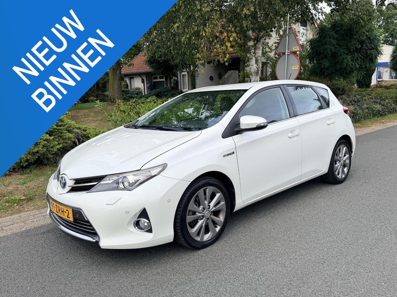 Toyota Auris - 1.8 Hybrid Lease Pro•Leder•Navi - AutoWereld.nl