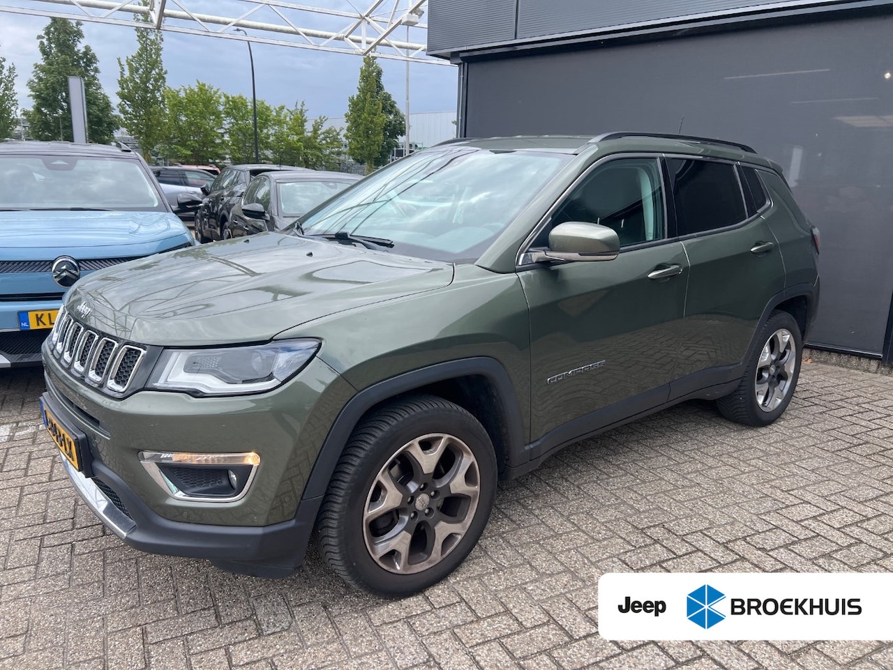 Jeep Compass - 1.4 MultiAir Limited 4x4 l Trekhaak l Navigatie l Green Metallic l Side Assist l Parkeerse - AutoWereld.nl