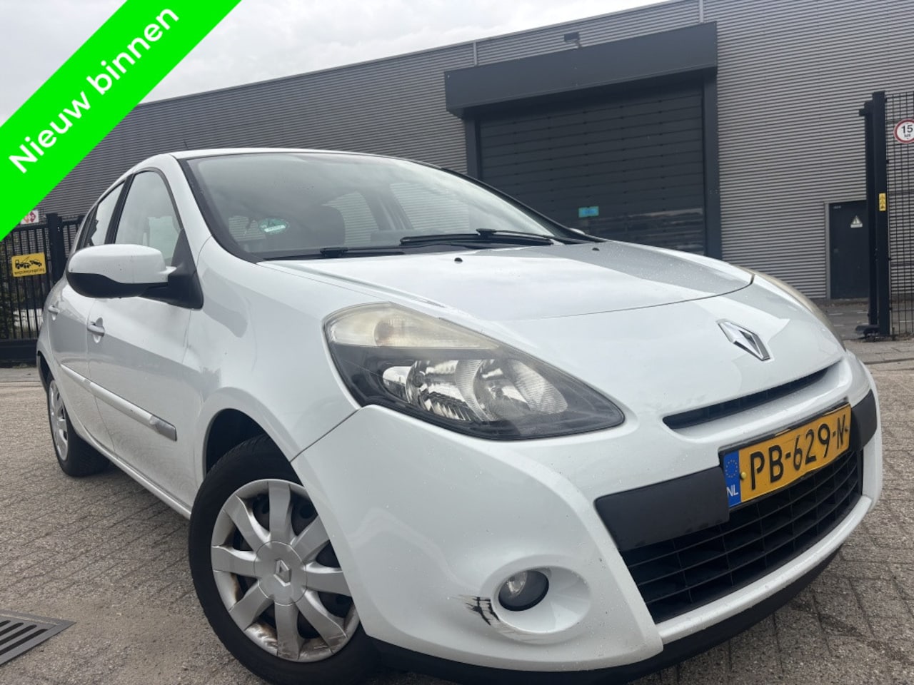 Renault Clio - 1.5 dCi Parisienne Navi|Bluetooth|Cruise|Clima - AutoWereld.nl