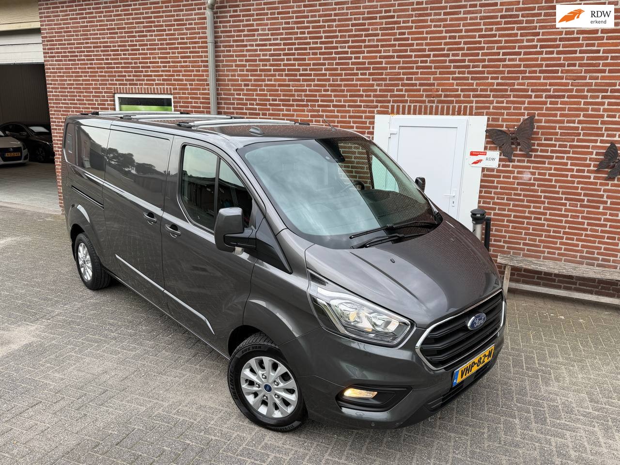 Ford Transit Custom - 300 2.0 TDCI L3H2 Limited Automaat , Camera, Cruise control, omvormer, 3 zits - AutoWereld.nl
