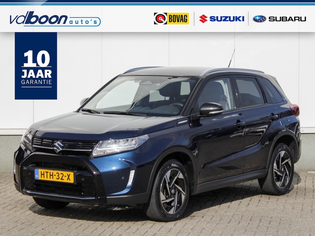 Suzuki Vitara - 1.5 Hybrid Style Automaat | Navi | Adap. Cruise | Clima | Camera | Trekhaak - AutoWereld.nl