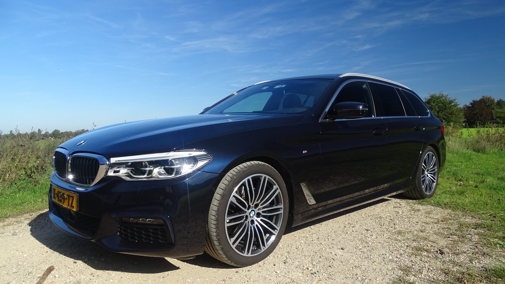BMW 5-serie Touring - 530i xDrive High Executive M Uitvoering - AutoWereld.nl