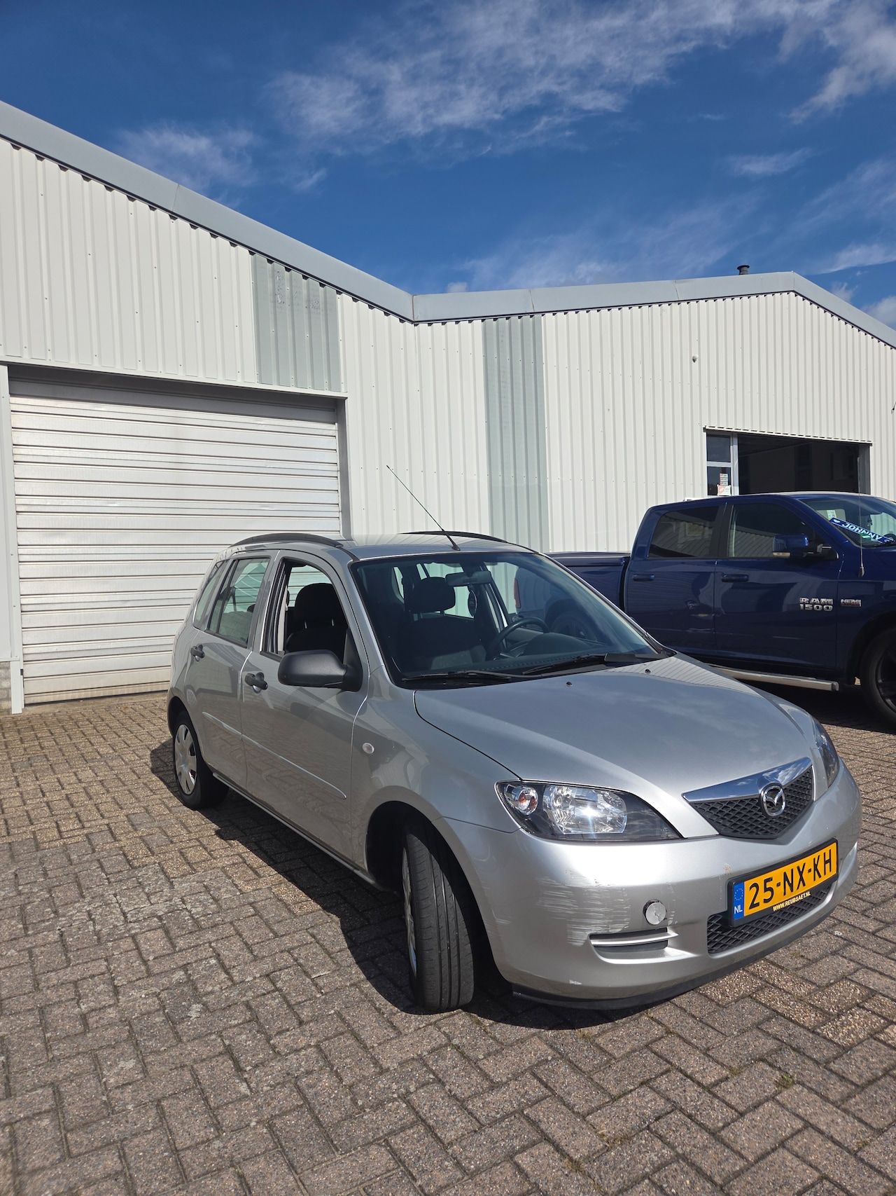 Mazda 2 - 1.4 Exclusive airco - elektrische ramen - steurwiel bediening - AutoWereld.nl