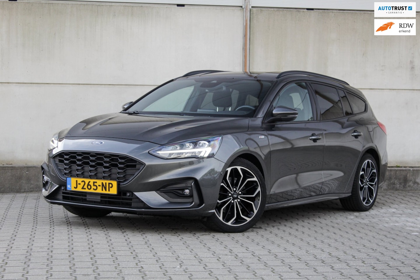 Ford Focus Wagon - 1.0 EcoBoost Titanium Business - ST-Line - Automaat - Camera - Trekhaak - Stuurverwarming - AutoWereld.nl