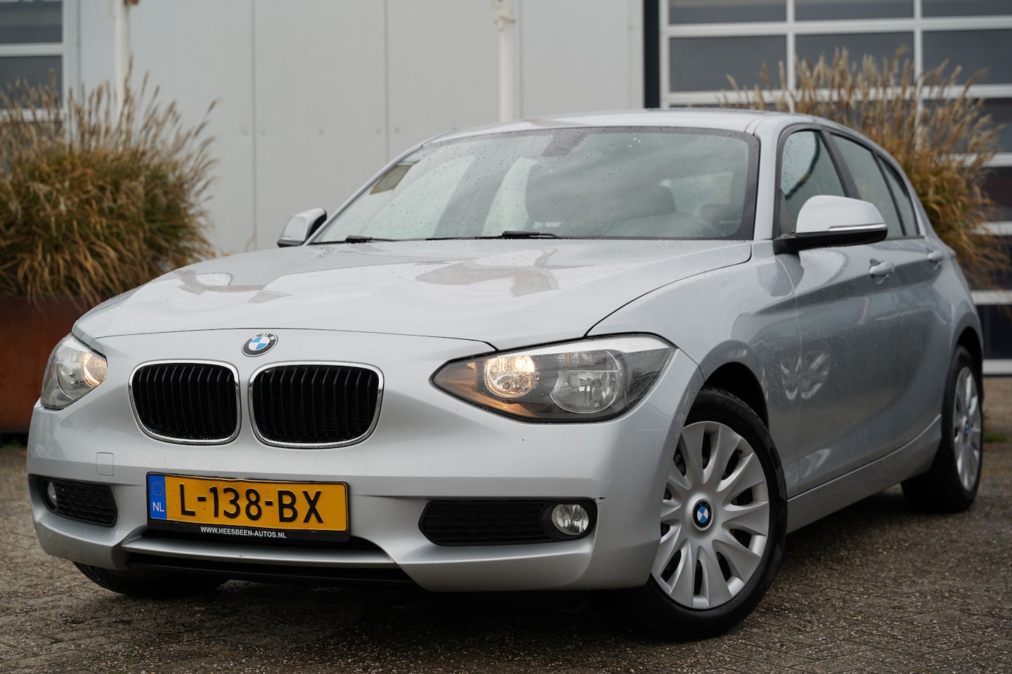 BMW 1-serie - 114i EDE 100pk | Airco | Bluetooth | Cruise control | Isofix bevestiging voor kinderzitjes - AutoWereld.nl