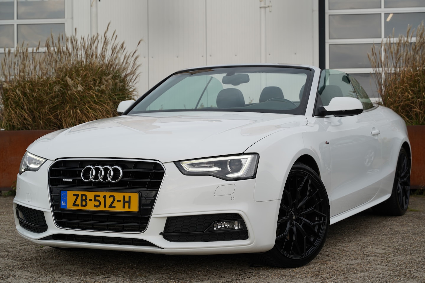 Audi A5 Cabriolet - 2.0 TFSI quattro 3x S-line | Audio-navigatie full map | Bang & Olufsen | Elektrisch bedien - AutoWereld.nl