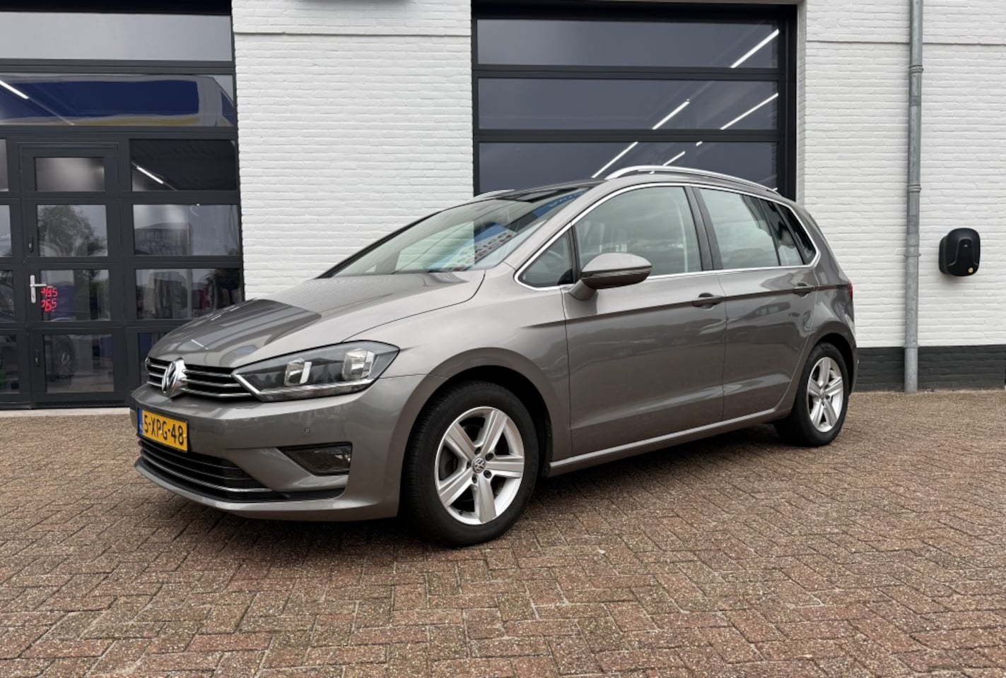 Volkswagen Golf Sportsvan - 1.4 TSI Highline 1.4 TSI 125pk Highline - AutoWereld.nl