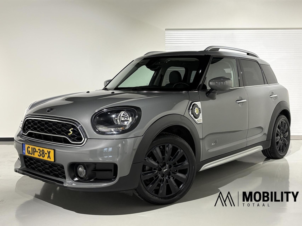 MINI Countryman - 1.5 Cooper S E ALL4|Navi|Sportstoelen|Cruise|Clima|Dealer onderhouden| - AutoWereld.nl