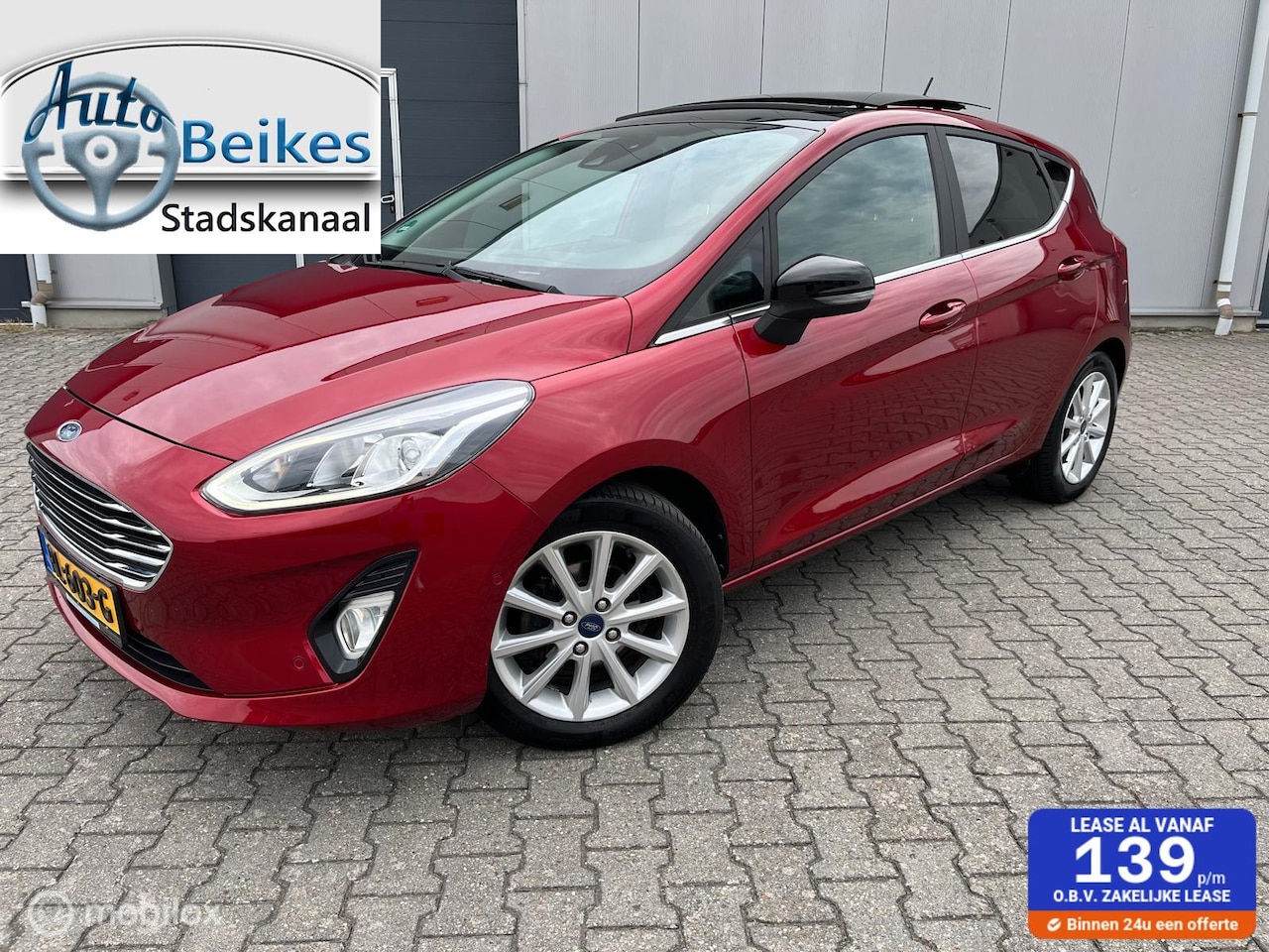Ford Fiesta - 1.0 EcoBoost Titanium met panodak - AutoWereld.nl