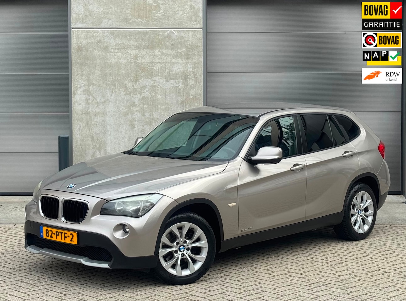 BMW X1 - SDrive18i 150pk 2011 Grijs NAP|CLIMA|STOELVERWARM|PDC - AutoWereld.nl