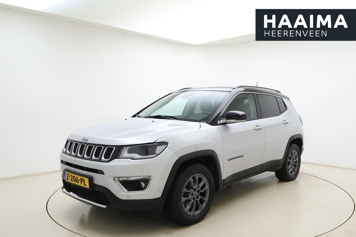 Jeep Compass - 4xe 190 Plug-in Hybrid Electric Limited Business Automaat | Navigatie | Camera | Zwart dak - AutoWereld.nl
