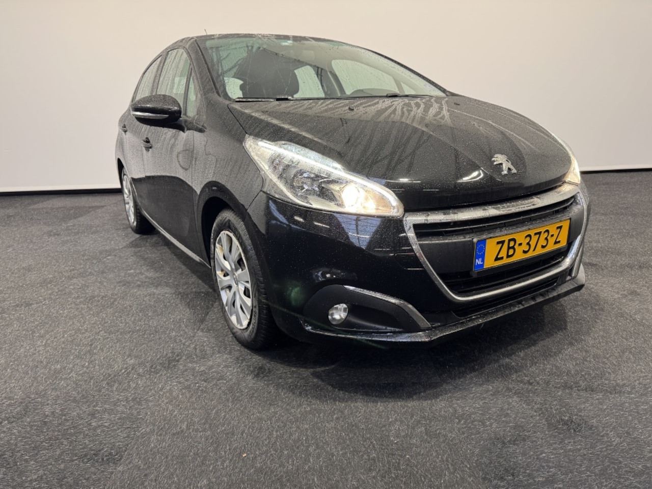 Peugeot 208 - Signature 1.2 PureTech Cruise control Airco Navigatie - AutoWereld.nl