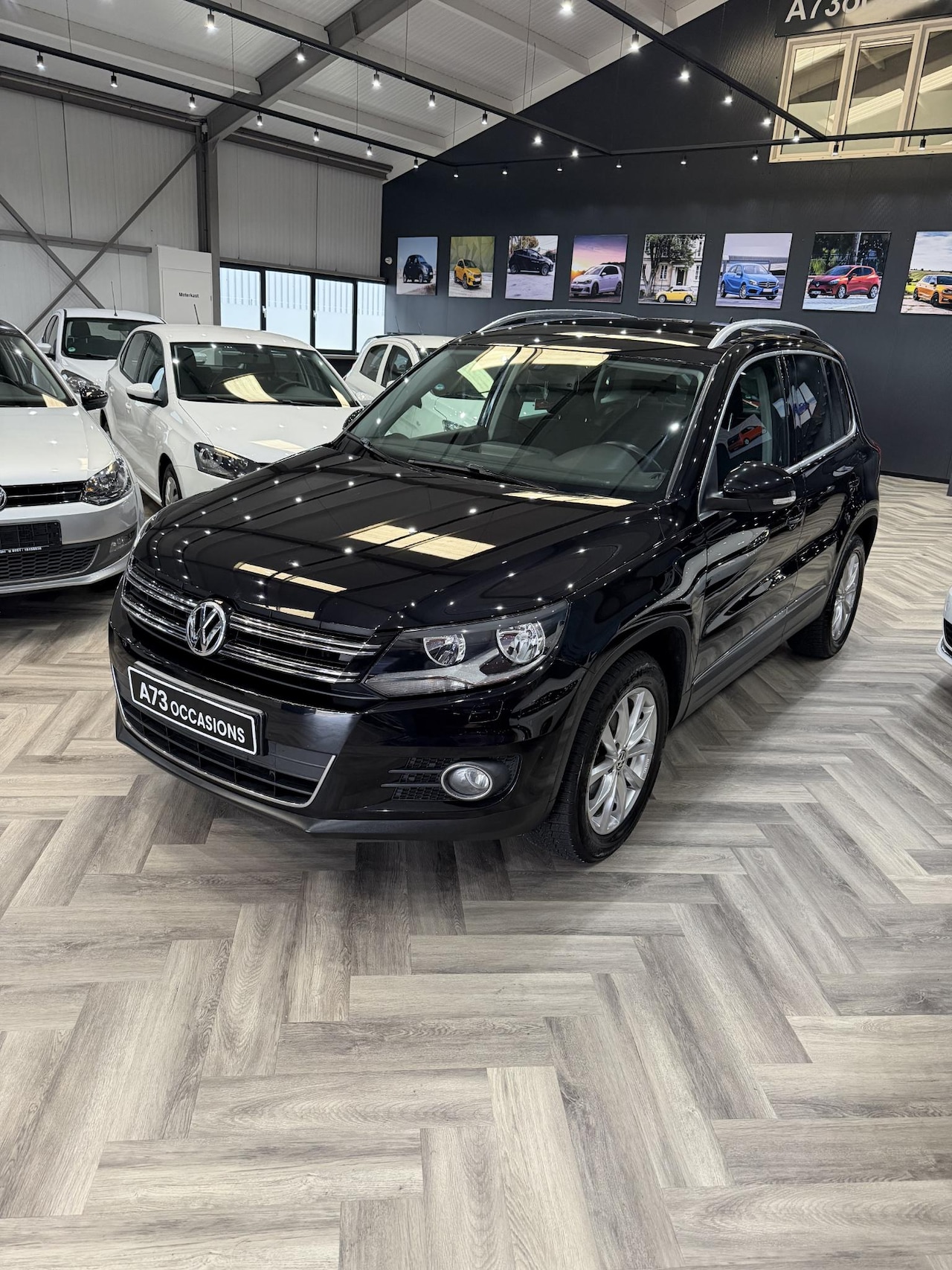 Volkswagen Tiguan - 2.0 TSI Sport&Style 4Motion AUTOMAAT TREKHAAK - AutoWereld.nl