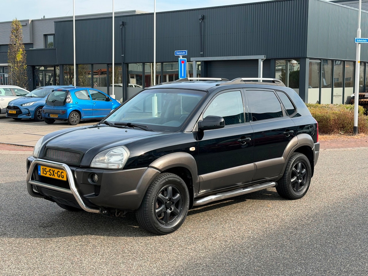Hyundai Tucson - 2.0i Dynamic Airco - AutoWereld.nl
