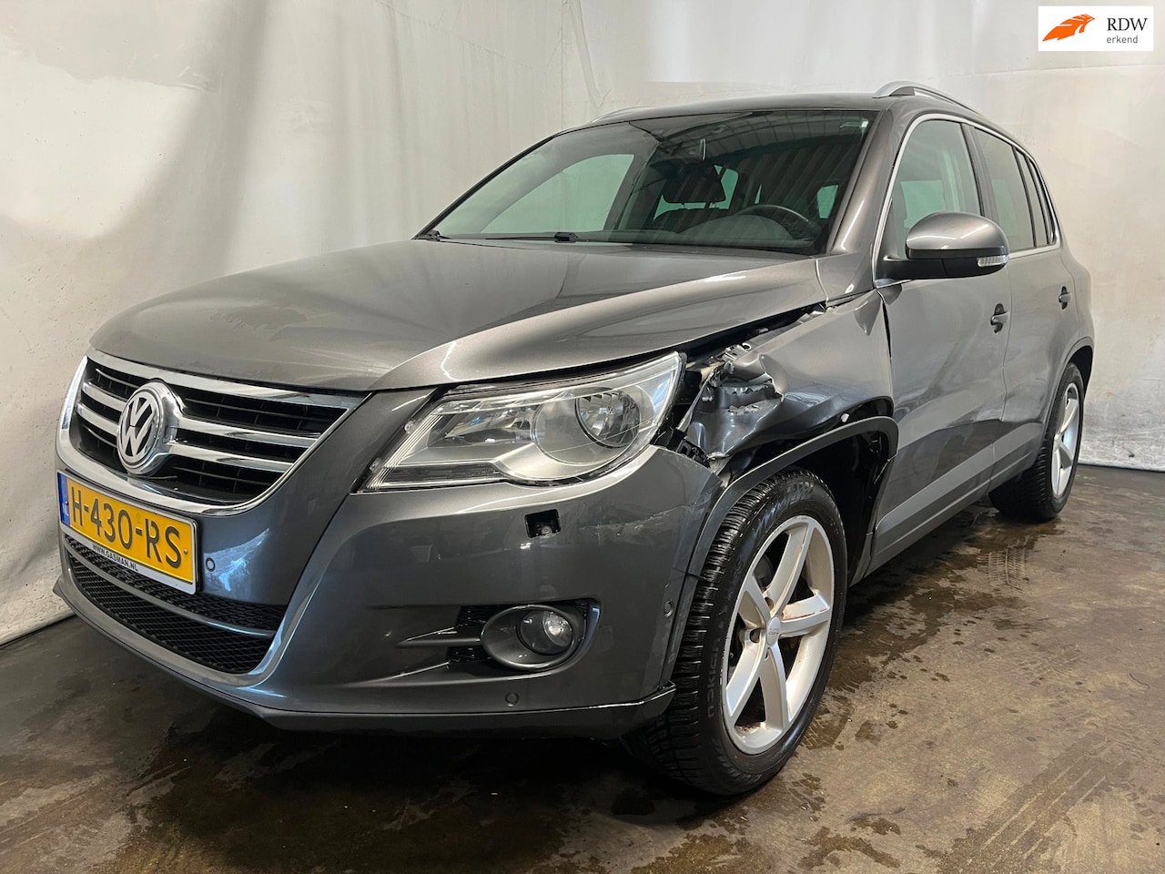 Volkswagen Tiguan - 1.4 TSI Comfort&Design - Schade - AutoWereld.nl