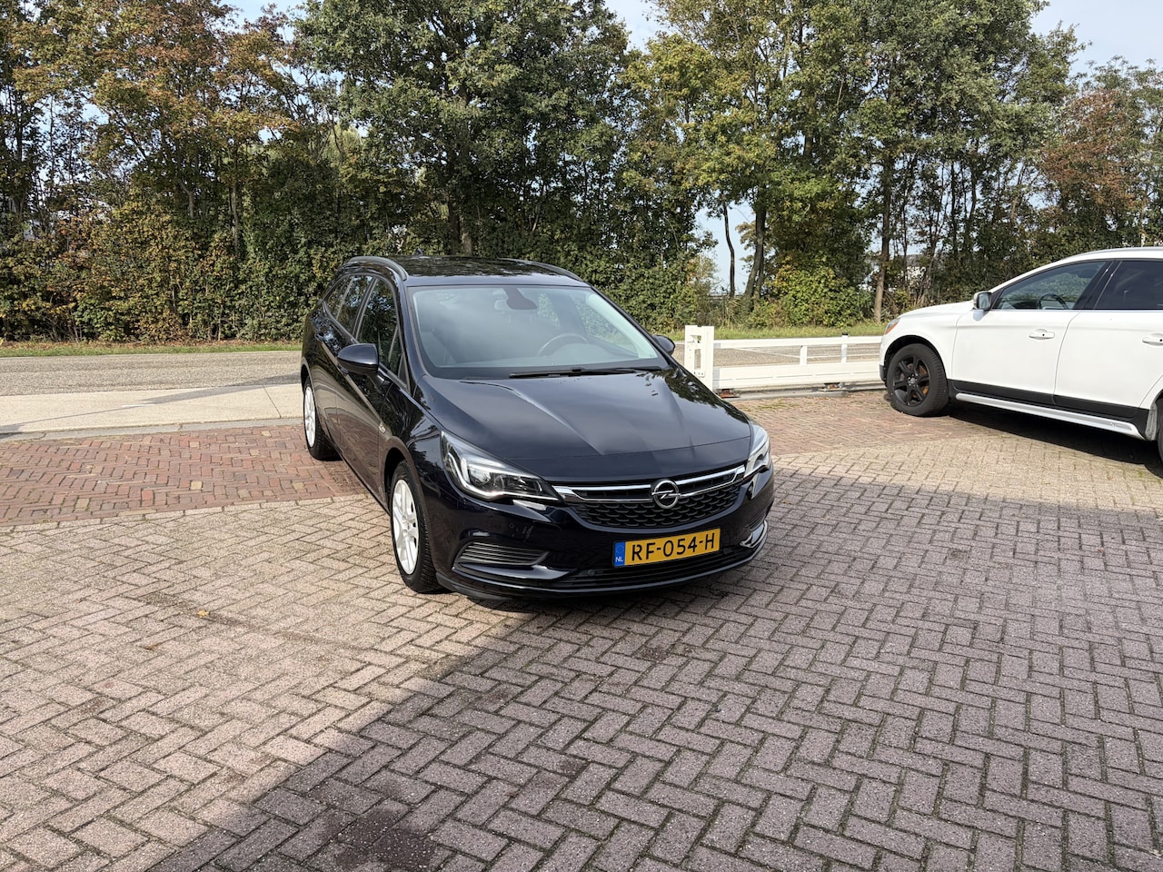 Opel Astra Sports Tourer - 1.0 Online Edition CARPLAY NAVI PDC - AutoWereld.nl