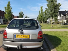 Opel Corsa - 1.2i-16V Strada Cool