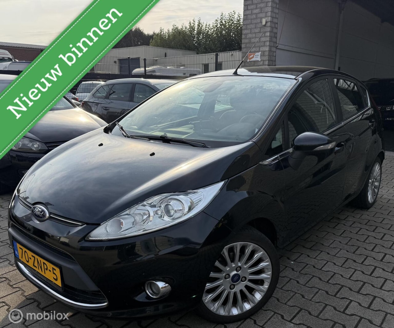 Ford Fiesta - 1.25 Titanium / BJ 2012 / Airco / 5DRS / N.A.P - AutoWereld.nl