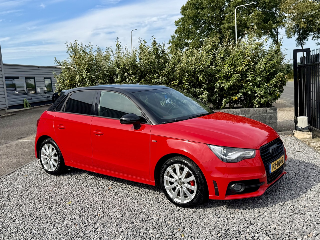 Audi A1 Sportback - 1.6 TDI S-Line Xenon|Navi|Media|PDC Rood! - AutoWereld.nl