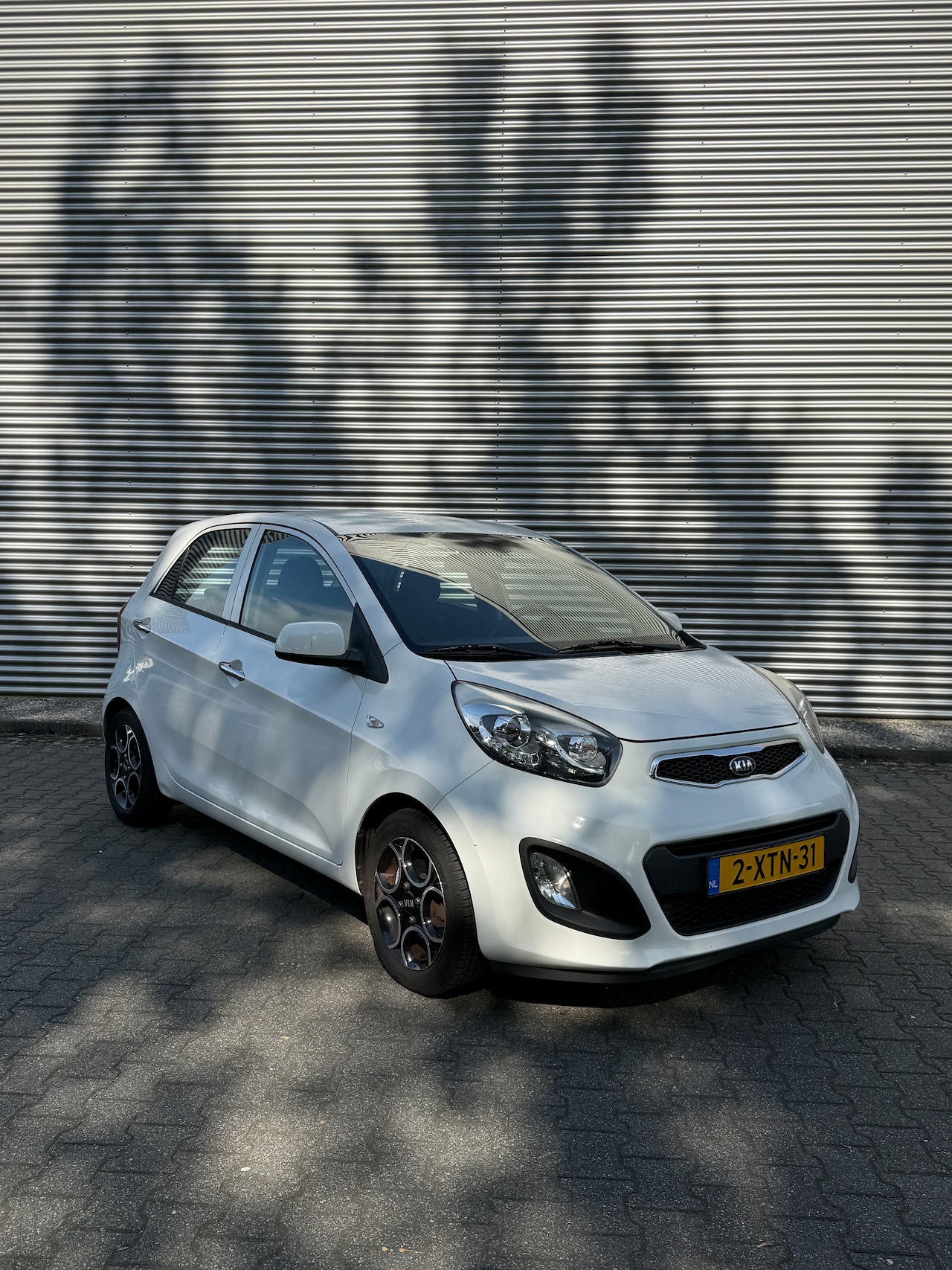 Kia Picanto - 1.0 CVVT BusinessLine Navigator - AutoWereld.nl