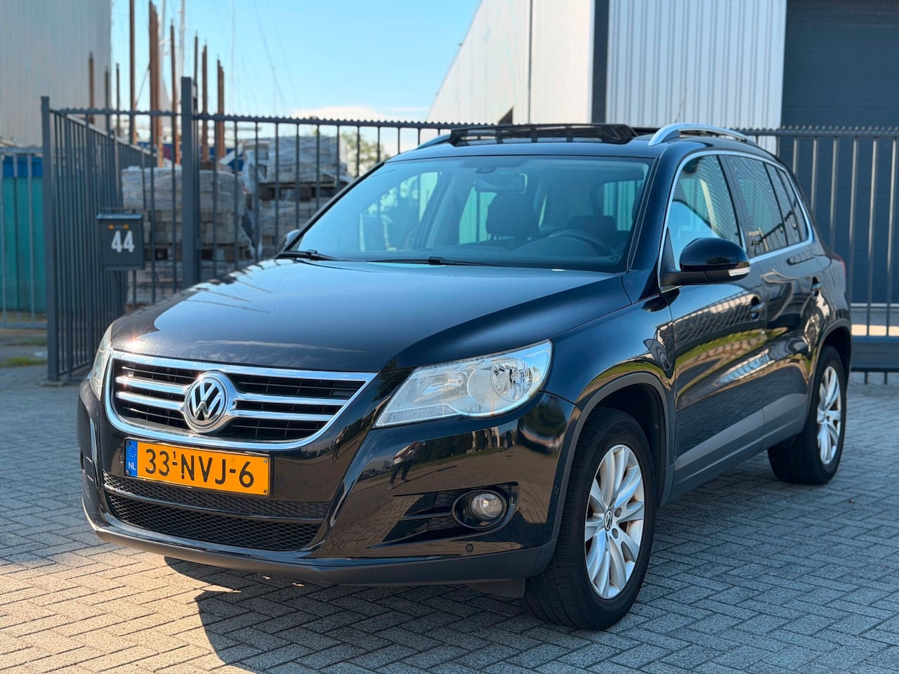 Volkswagen Tiguan - 1.4 TSI Sport&Style Pano Navi Camera Clima - AutoWereld.nl