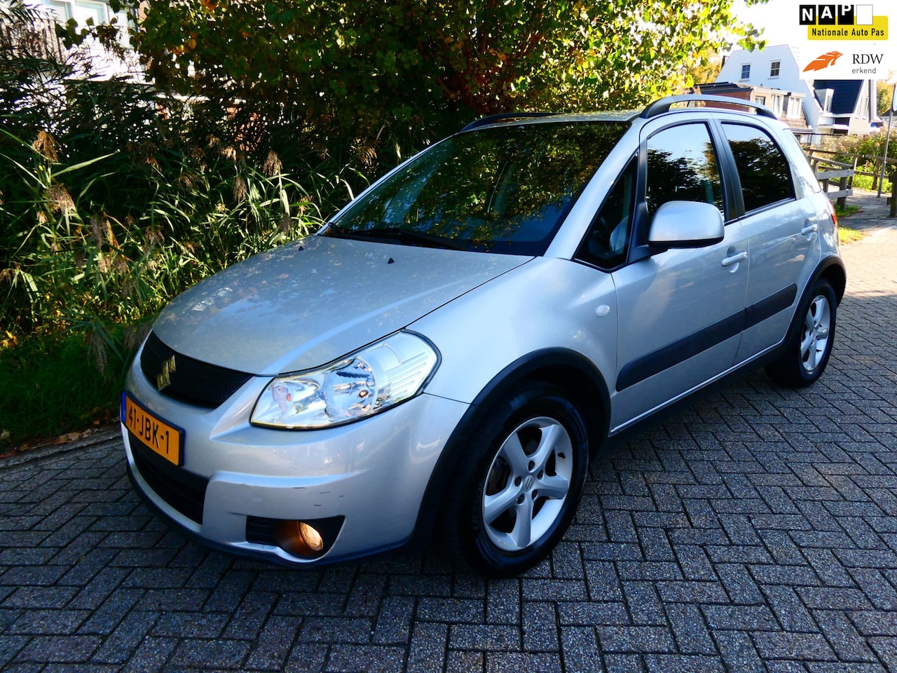 Suzuki SX4 - 1.6i 107pk Automaat Airco Trekhaak Hoge instap Historie - AutoWereld.nl