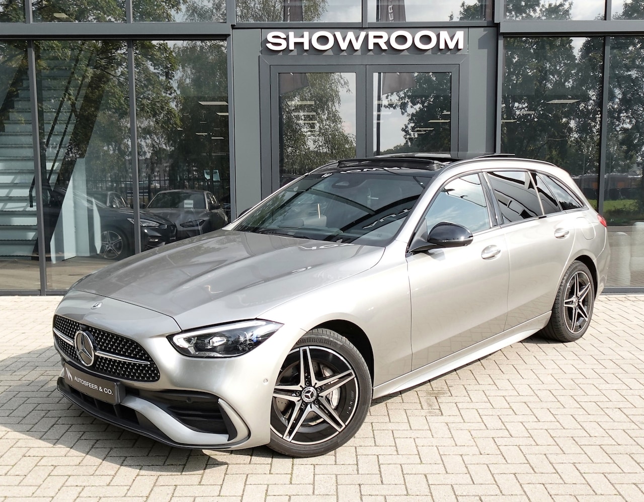 Mercedes-Benz C-klasse Estate - 300 e AMG Line PANO KEYLESS 360 - AutoWereld.nl