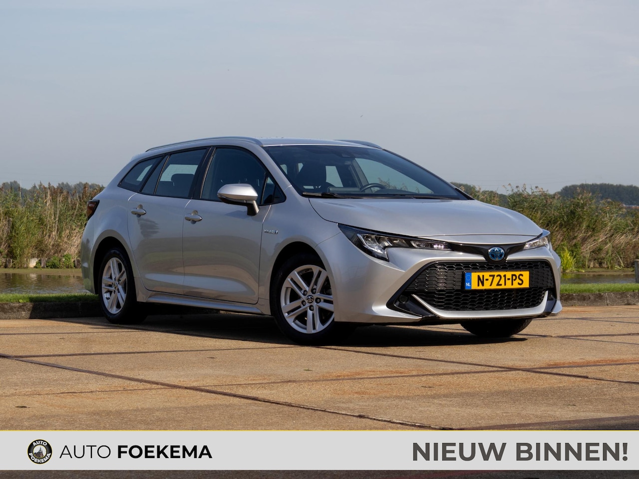 Toyota Corolla Touring Sports - 1.8 Hybrid Active Camera 16" ACC LED - AutoWereld.nl